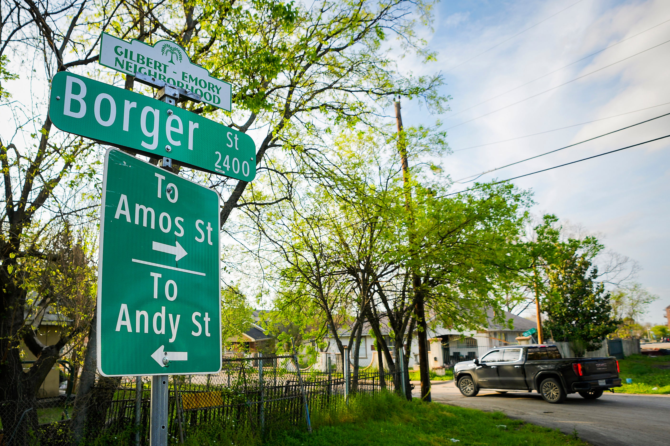 A sign points toward Amos Street and Andy Street in the Gilbert-Emory neighborhood on...