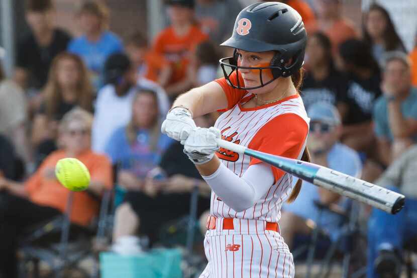 Rockwall’s Ava Wallace hits during the fourth inning of a softball game against Waxahachie...