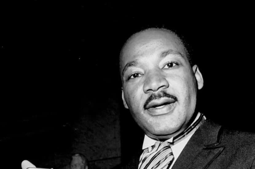 
 Dr. Martin Luther King, Jr. holds his 1964 Nobel Peace Prize medal in Oslo, Norway. King...