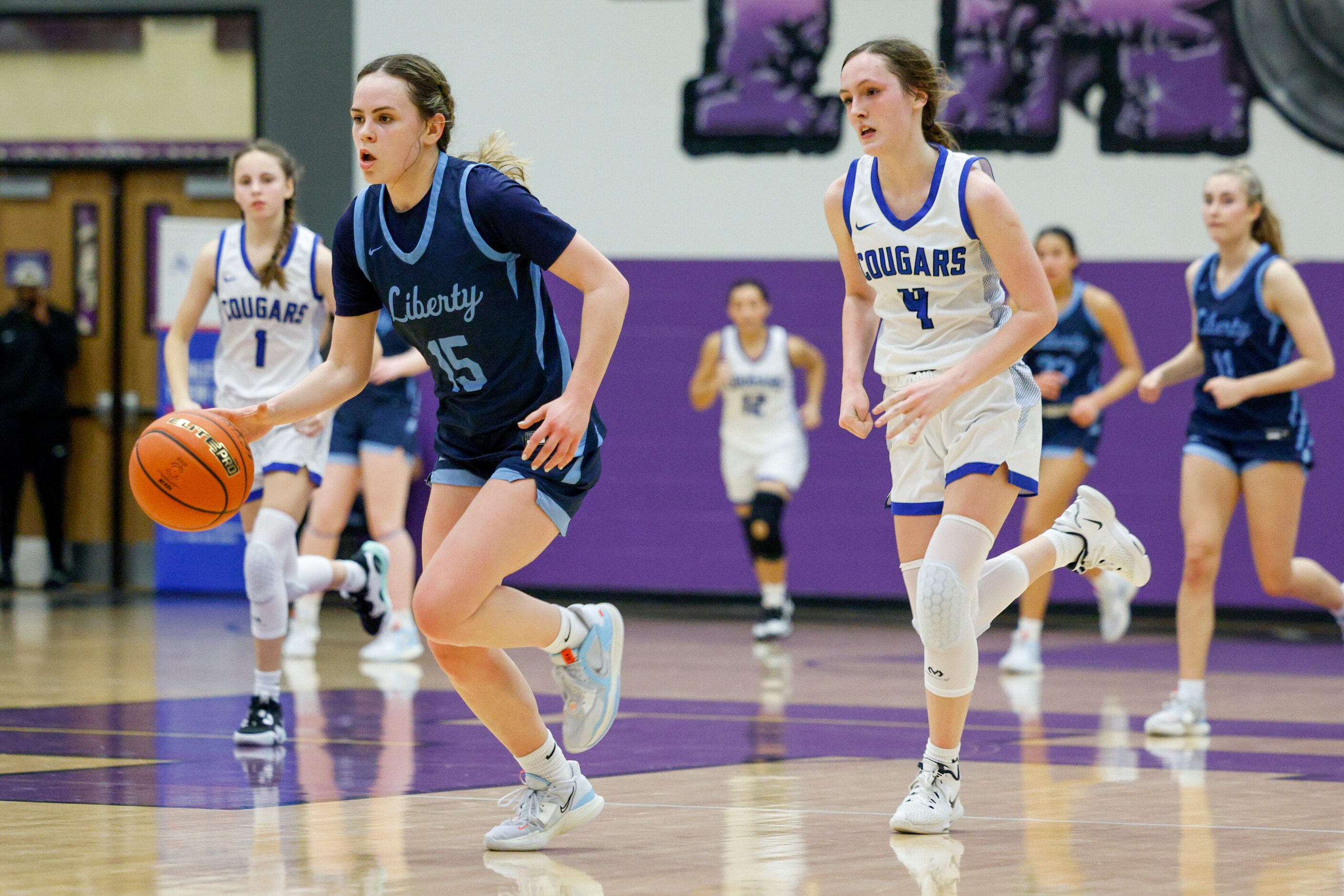 Argyle Liberty Christian guard Emma Martin (15) races downcourt ahead of Tyler Grace...