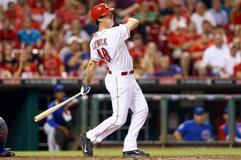 CINCINNATI, OH - AUGUST 26: Ryan Ludwick #48 of the Cincinnati Reds hits the ball against...