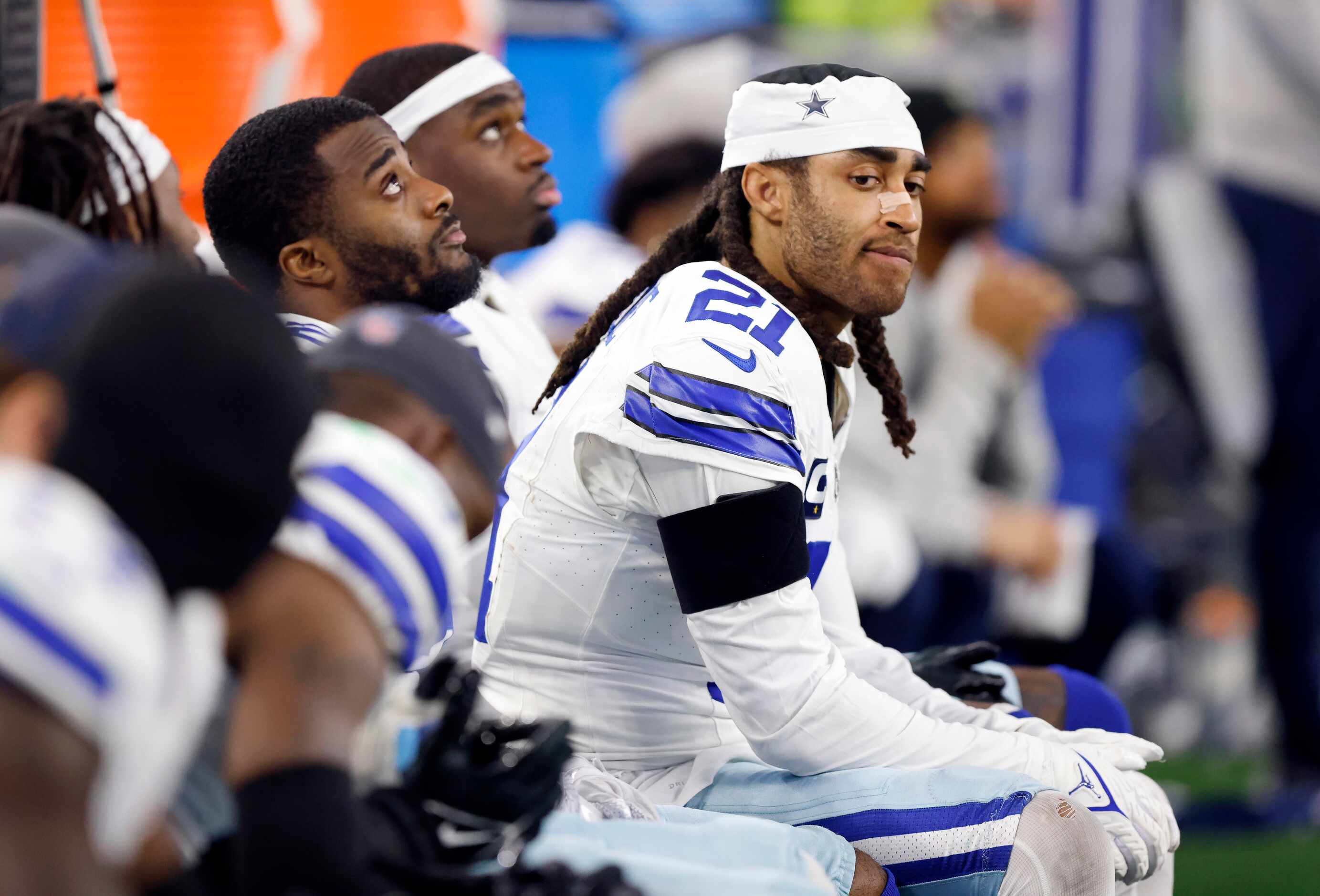 Dallas Cowboys cornerback Stephon Gilmore (21) watches the fourth quarter from the bench...