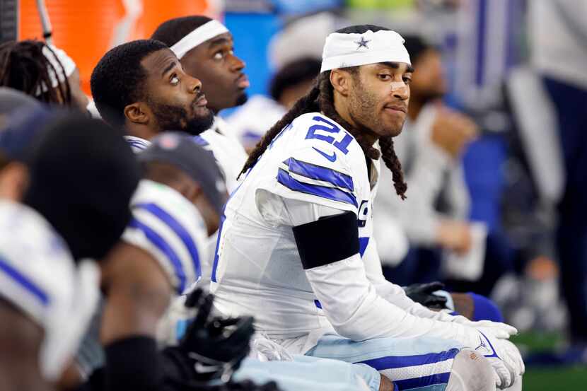 Dallas Cowboys cornerback Stephon Gilmore (21) watches the fourth quarter from the bench...