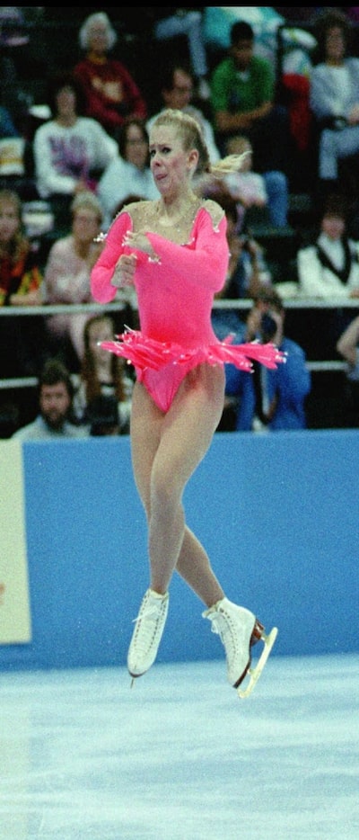 Tonya Harding of Portland, Ore., twists above the ice as  she completes her routine on her...