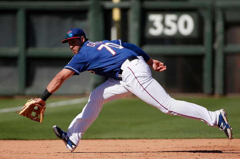 Texas Rangers third baseman Joey Gallo makes a play to get Kansas City Royals outfielder...