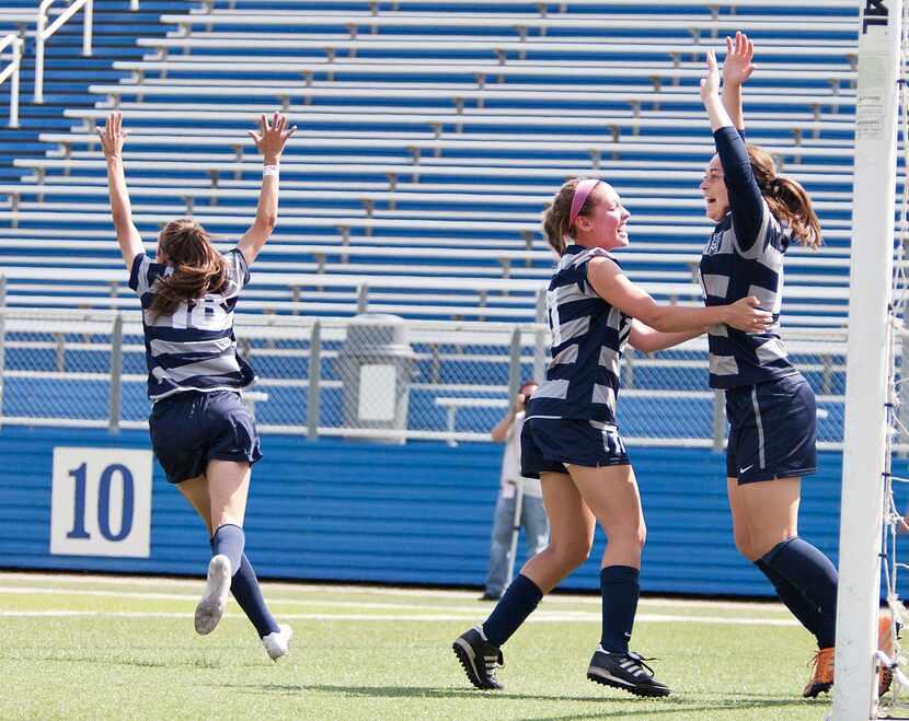 Wylie East players (from right to left) Tori Smith, Maddi Simms and Addie McCain celebrate...