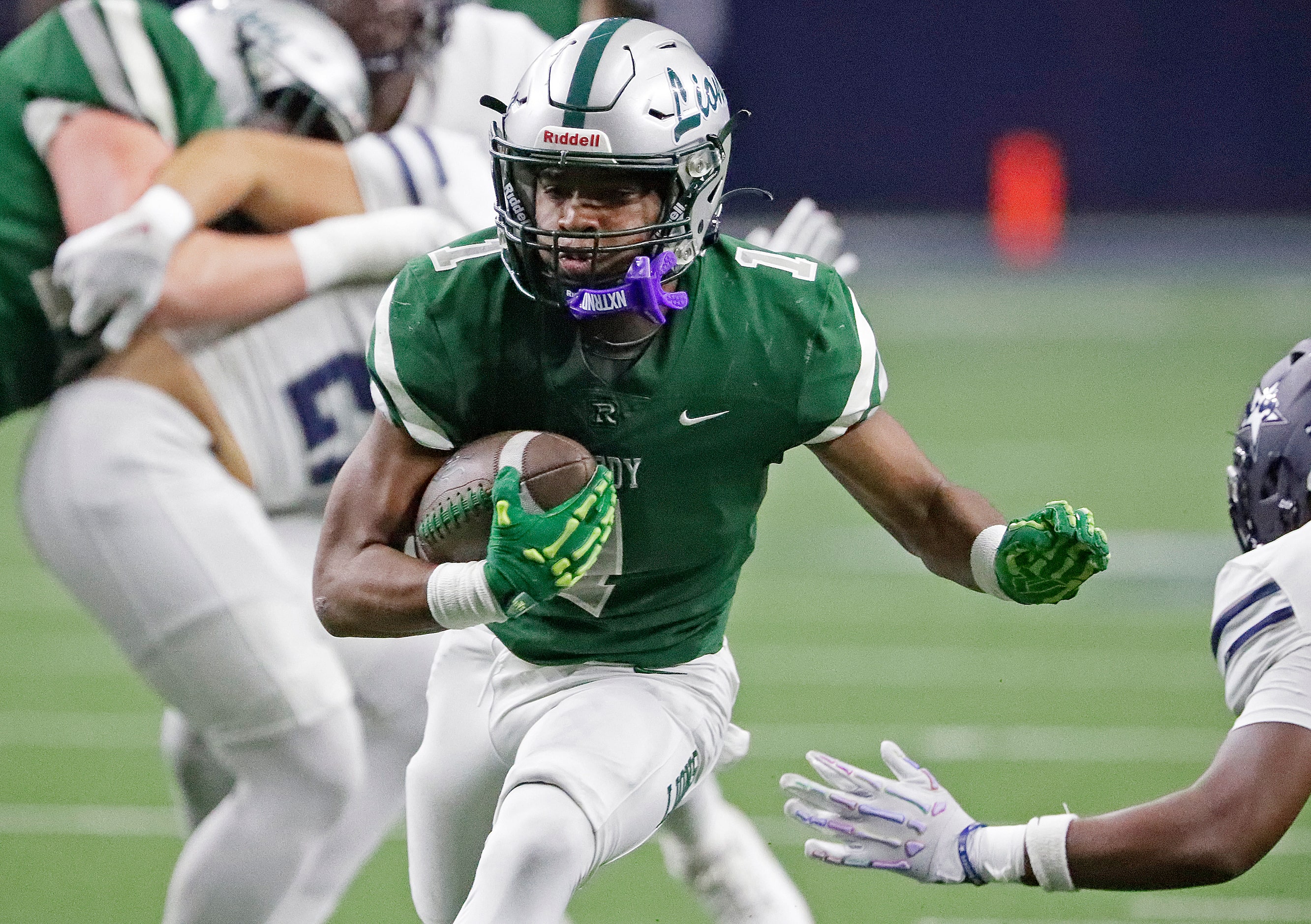 Reedy High School running back Triston Airy (1) runs for the games first touchdown during...