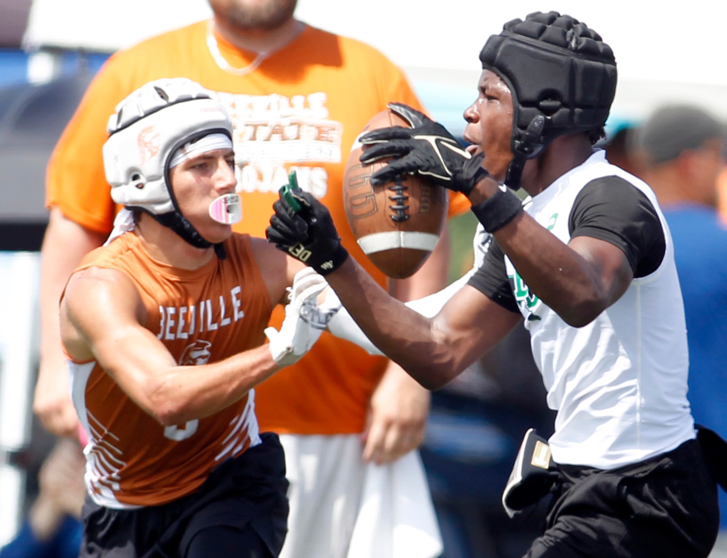 Lake Dallas defensive back DJ Hicks (2), right, returns an interception during second half...