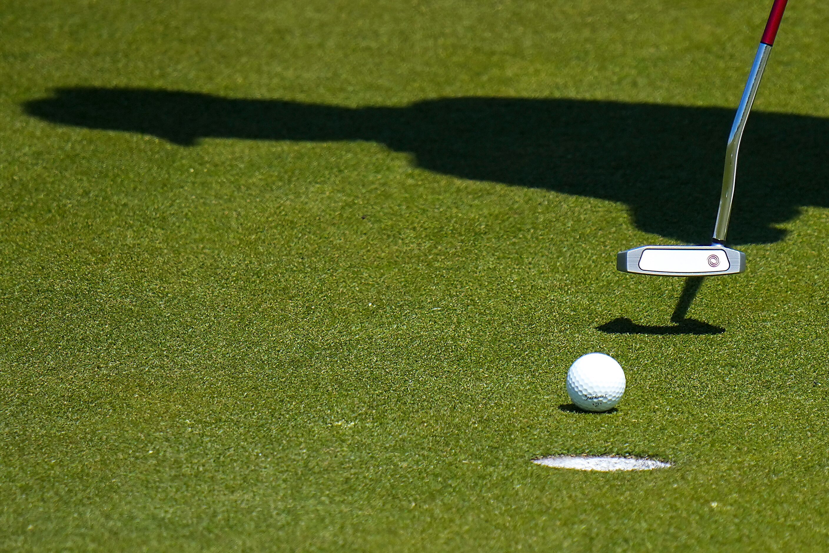 Taylor Dickson sinks a putt on the 18th hole during the final round of the Korn Ferry Tour...