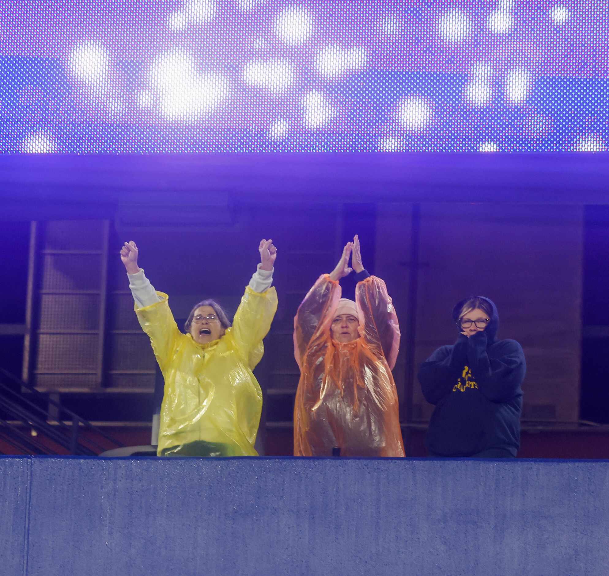 Forney fans cheer from the stands for their winning team at the McKinney ISD Stadium and...