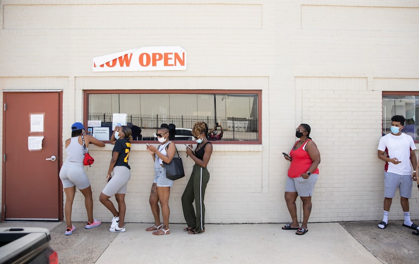 Customers wait in line to order food at Turkey Leg Paradise.