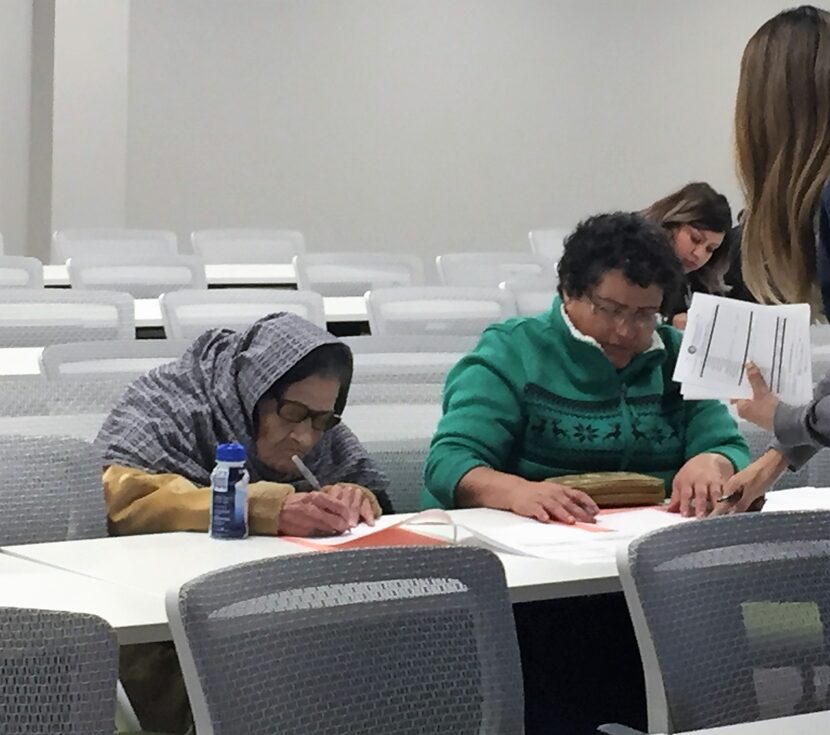 Amalia Rojas, a 93-year-old legal permanent resident, fills out U.S. citizenship forms at...