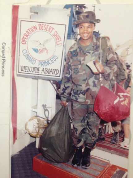 A photo of Judge Dominique Collins in her Air Force uniform, carrying her luggage and...