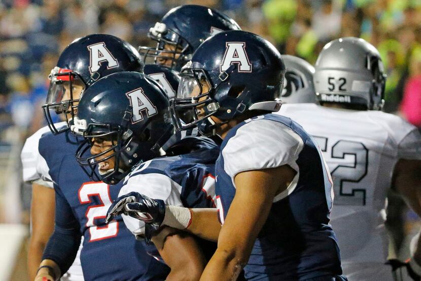 The Allen Eagles are all smiles after Theo Wease (10) recovered an offensive fumble in the...