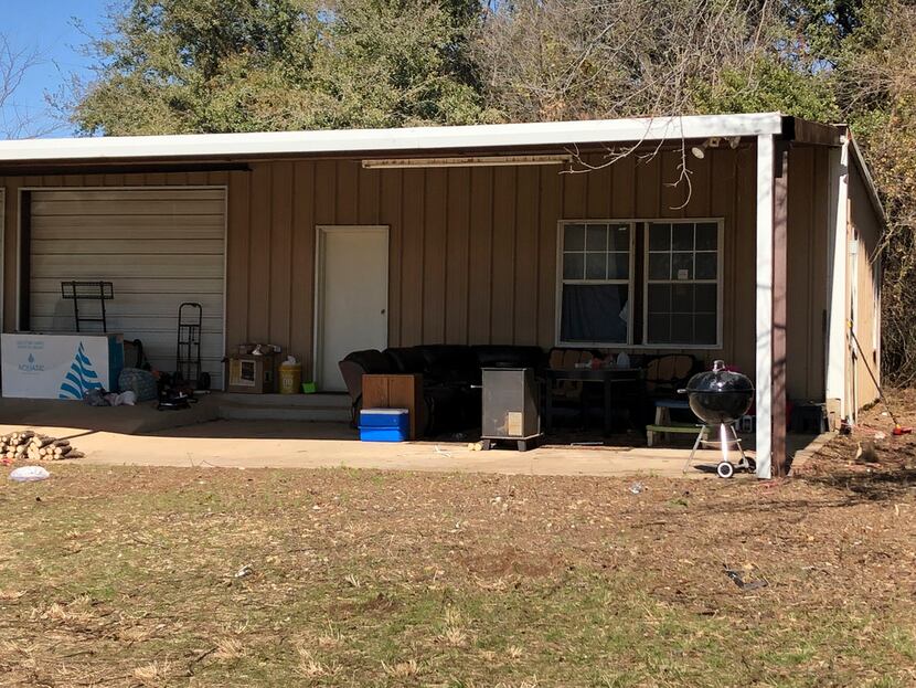 A photo shows the home where officials say Wise County sheriff's deputies found four...