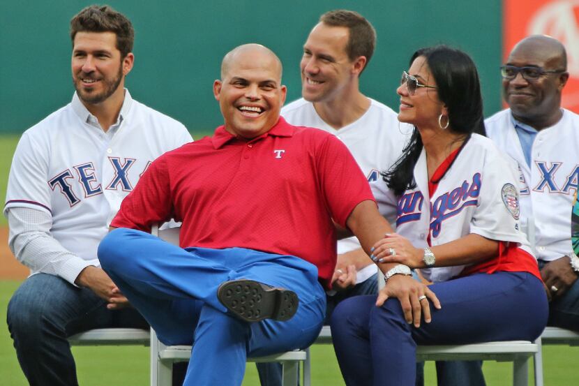 Ivan "Pudge" Rodriguez is all smiles as he shares a laugh with his wife Patry during...