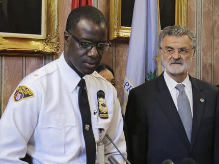 Cleveland Police Chief Calvin Williams, with Mayor Frank Jackson, said the department won't...