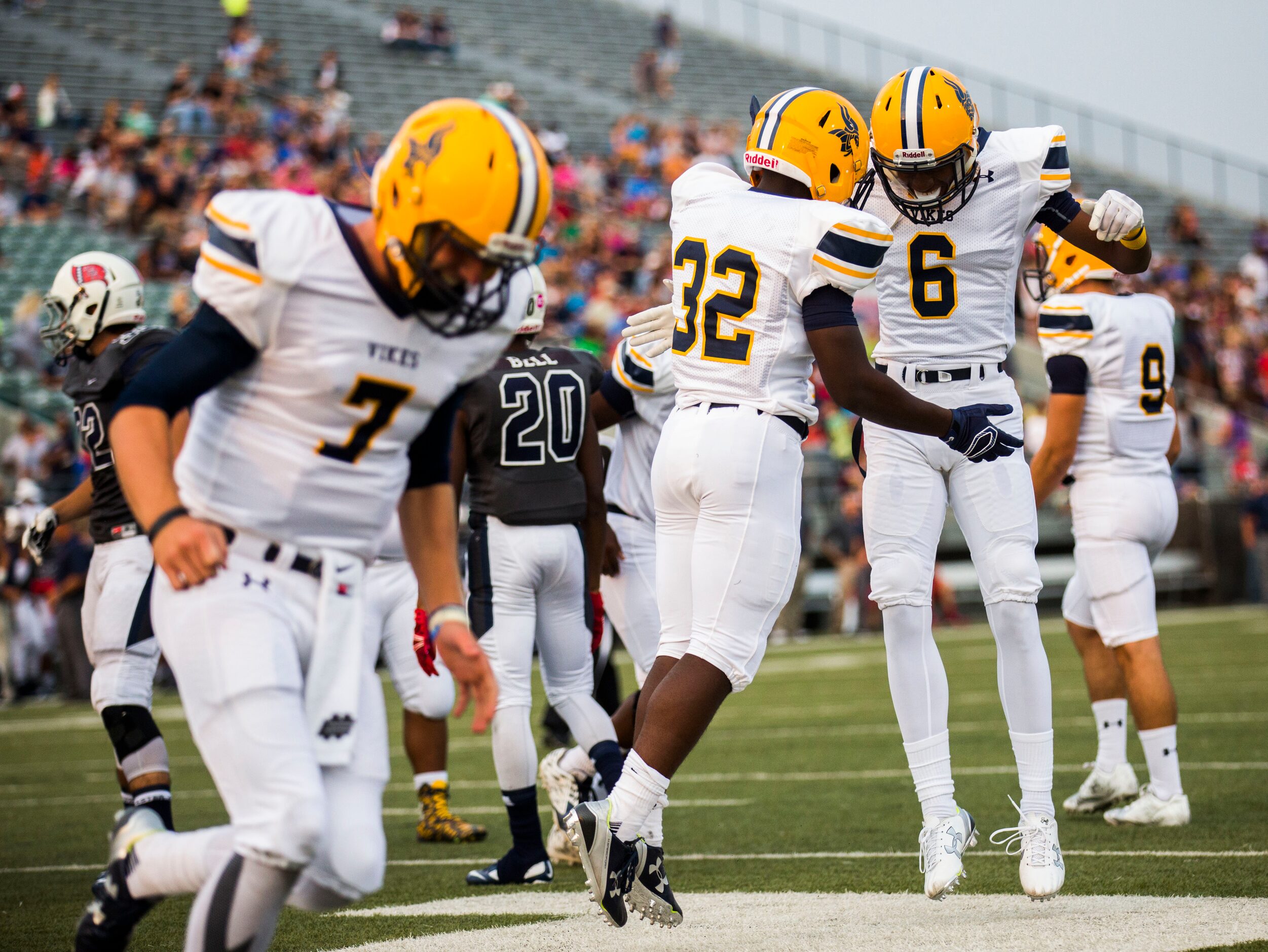 Arlington Lamar High School wide receiver Taron Owens (6) celebrates after he scored a touch...