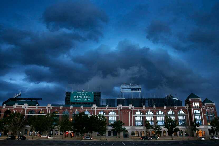 Clouds roll in over Globe Life Park in Arlington, Texas Friday, June 19, 2020 as a storm...