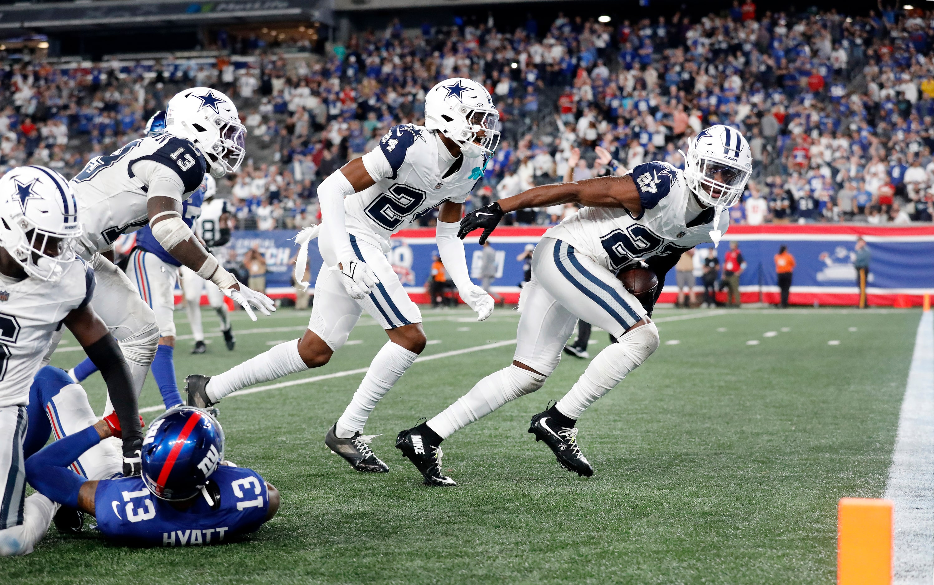 Dallas Cowboys cornerback Amani Oruwariye  (27) begins to celebrate his game-saving...