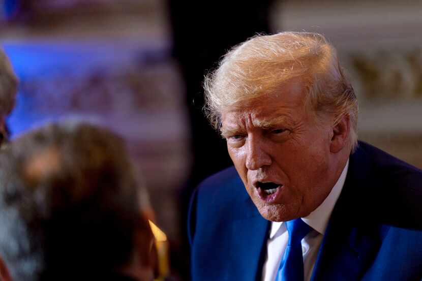FILE - Former President Donald Trump speaks to guests at Mar-a-lago on Nov. 8, 2022, in Palm...