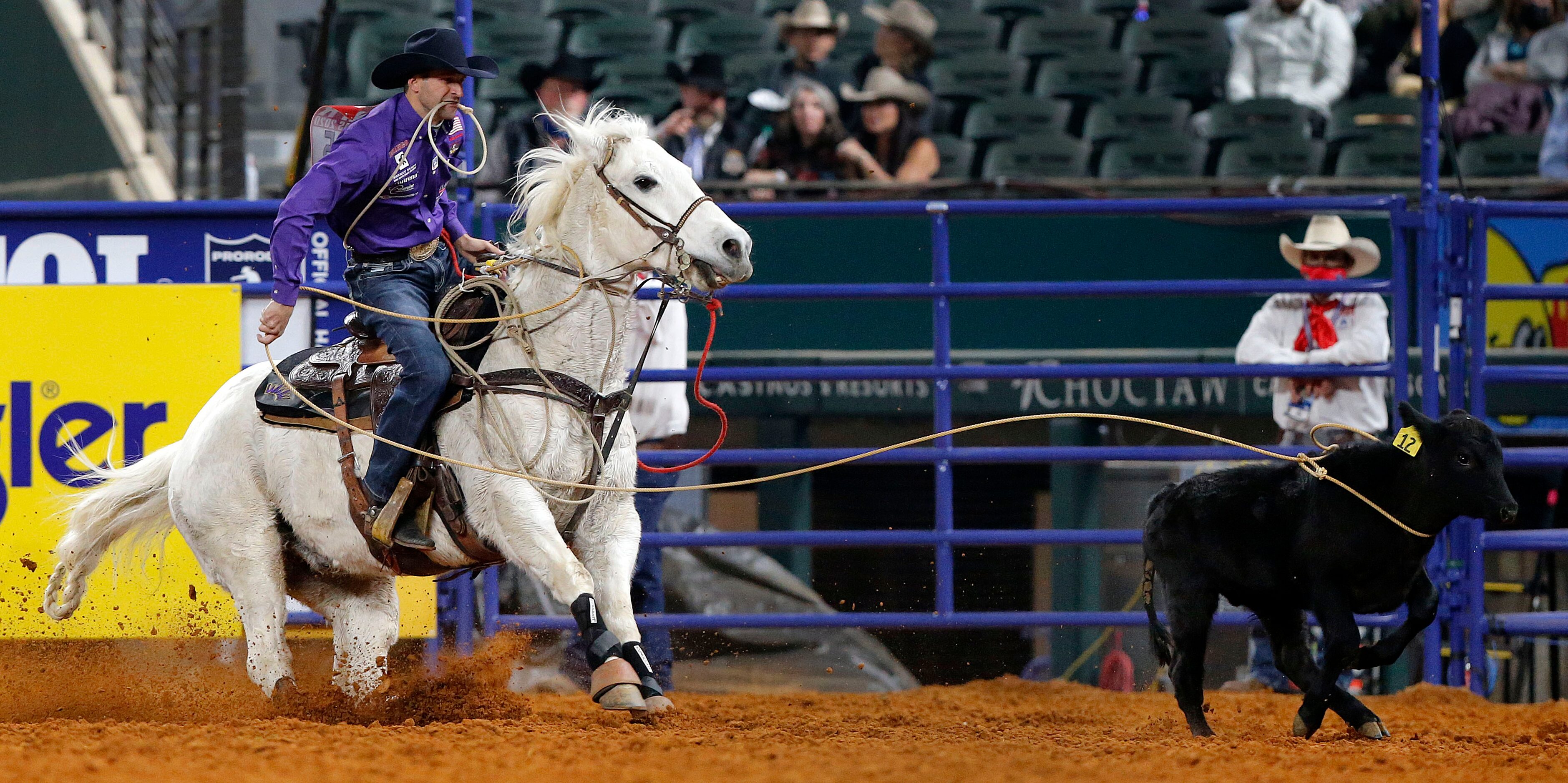 Tie-Down Roper Shane Hanchey of Sulpher, Louisiana lassoes a calf in Round 10 of the...