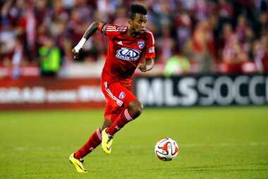 FC Dallas defender/midfielder Kellyn Acosta (23) of Plano dribbles the ball up the field...