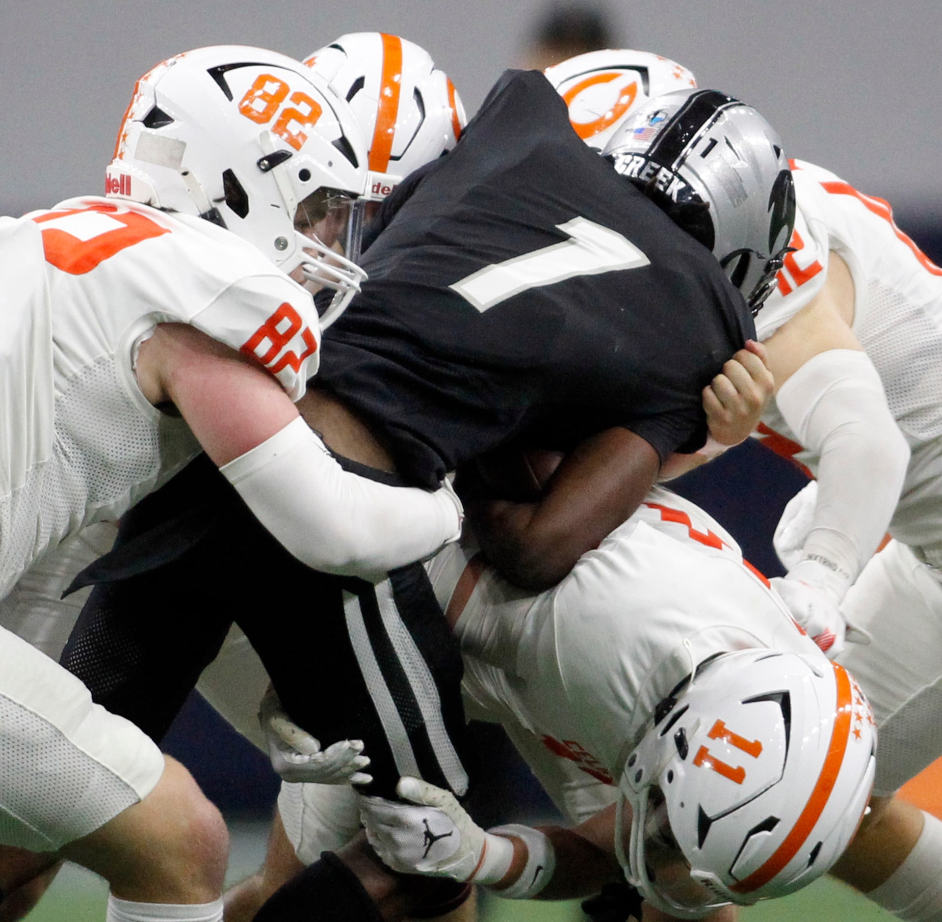 Frisco Panther Creek running back Sentel Simpson (1) is stopped by a host of Celina...