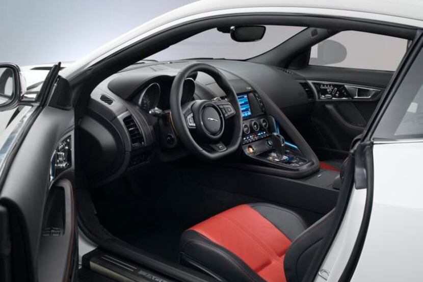 Space in the  two-seat Jaguar F-Type coupe is at a premium — but you can always use the rear...