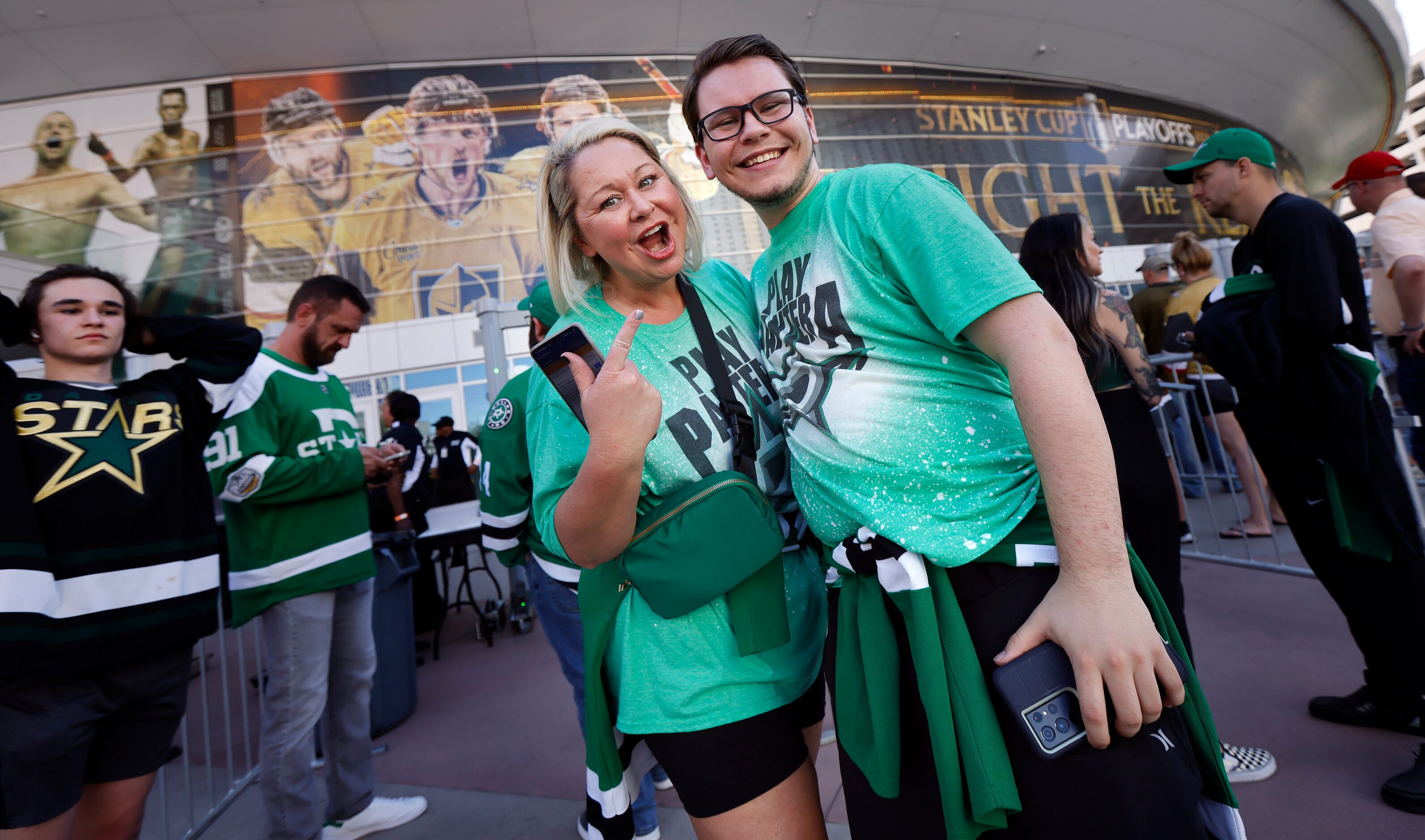 Dallas Stars season ticket holders Misty Lockhart and her son Bryson Lockhart of Grand...