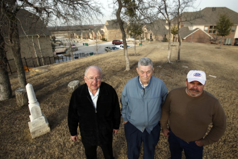 Subdivision project manager Bob Finley (left) made room for the old Herndon family cemetery...