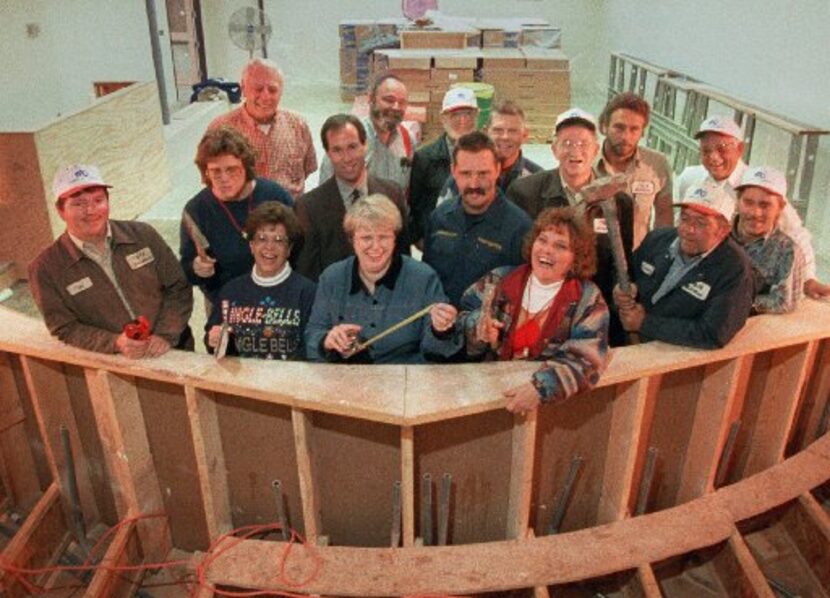  Roy Vaughn is seen in the third row on the far left as Midlothian city employees teamed up...