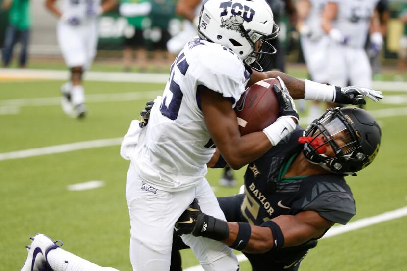 TCU Horned Frogs wide receiver KaVontae Turpin (25) is tackled by Baylor Bears defensive...