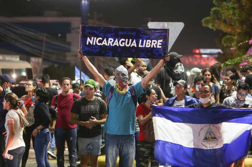 An anti-government protester holds up the Spanish sign: "Nicaragua free" at the Jean Paul...