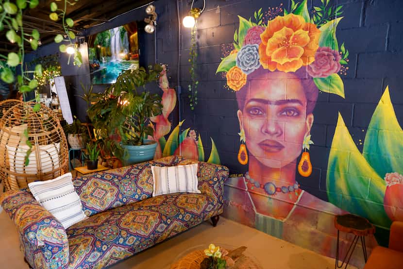 A mural of Mexican painter Frida Kahlo is seen at Cafe Frida, Tuesday, July 2, 2024, in...