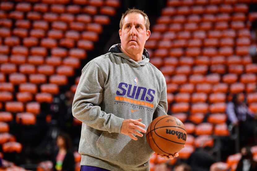 Assistant Coach Bryan Gates of the Phoenix Suns looks on during warms ups before the game...