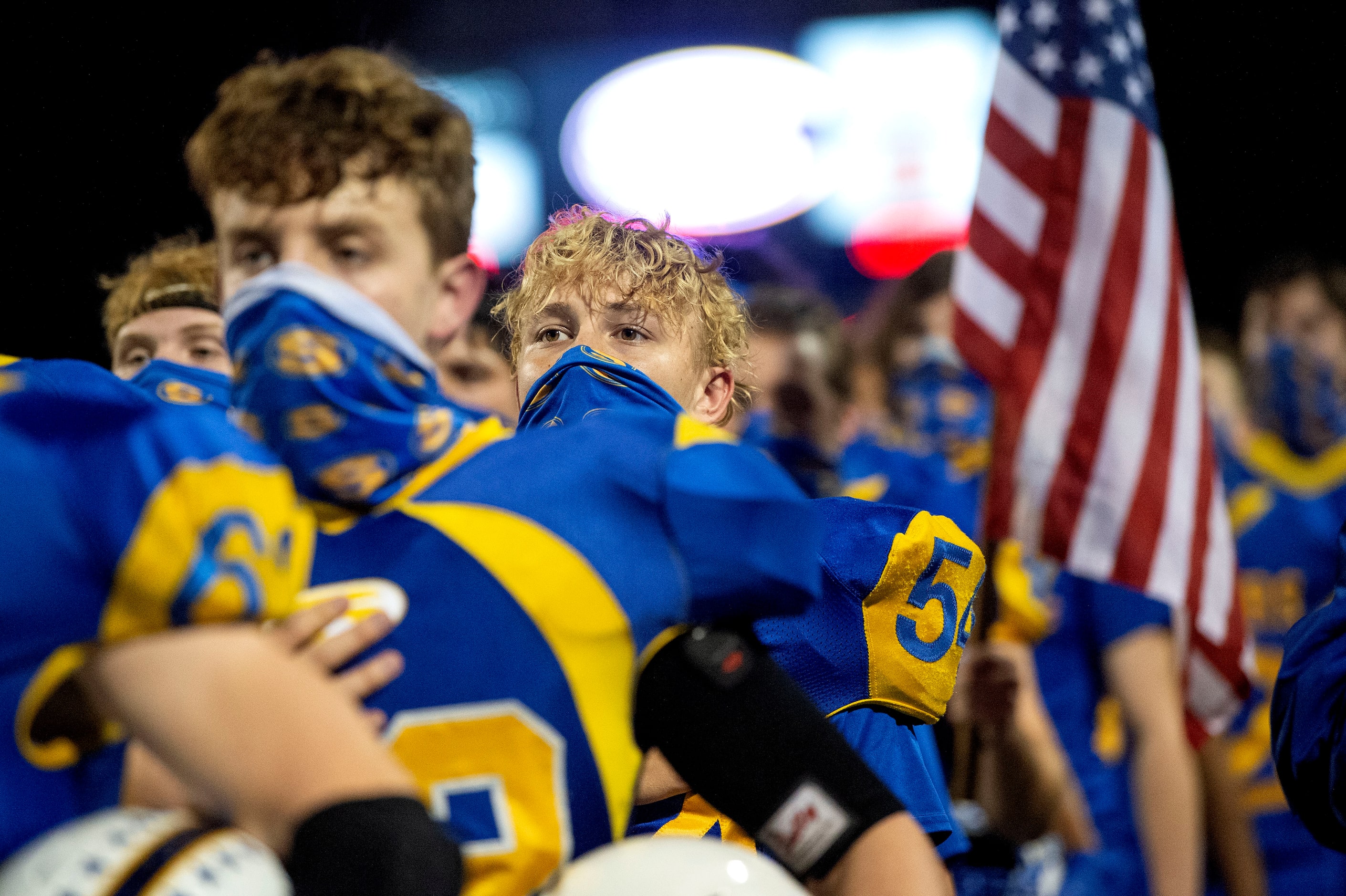 Sunnyvale sophomore linebacker Kaden Raz (54) stands for the national anthem before a high...