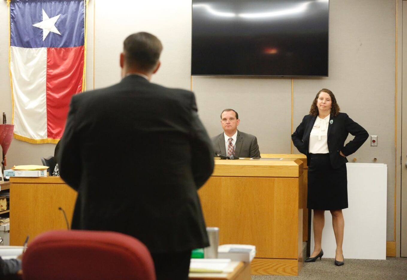 Mesquite police investigator Brent Ehrenberger (center) and defense attorney Kathy Lowthorp...