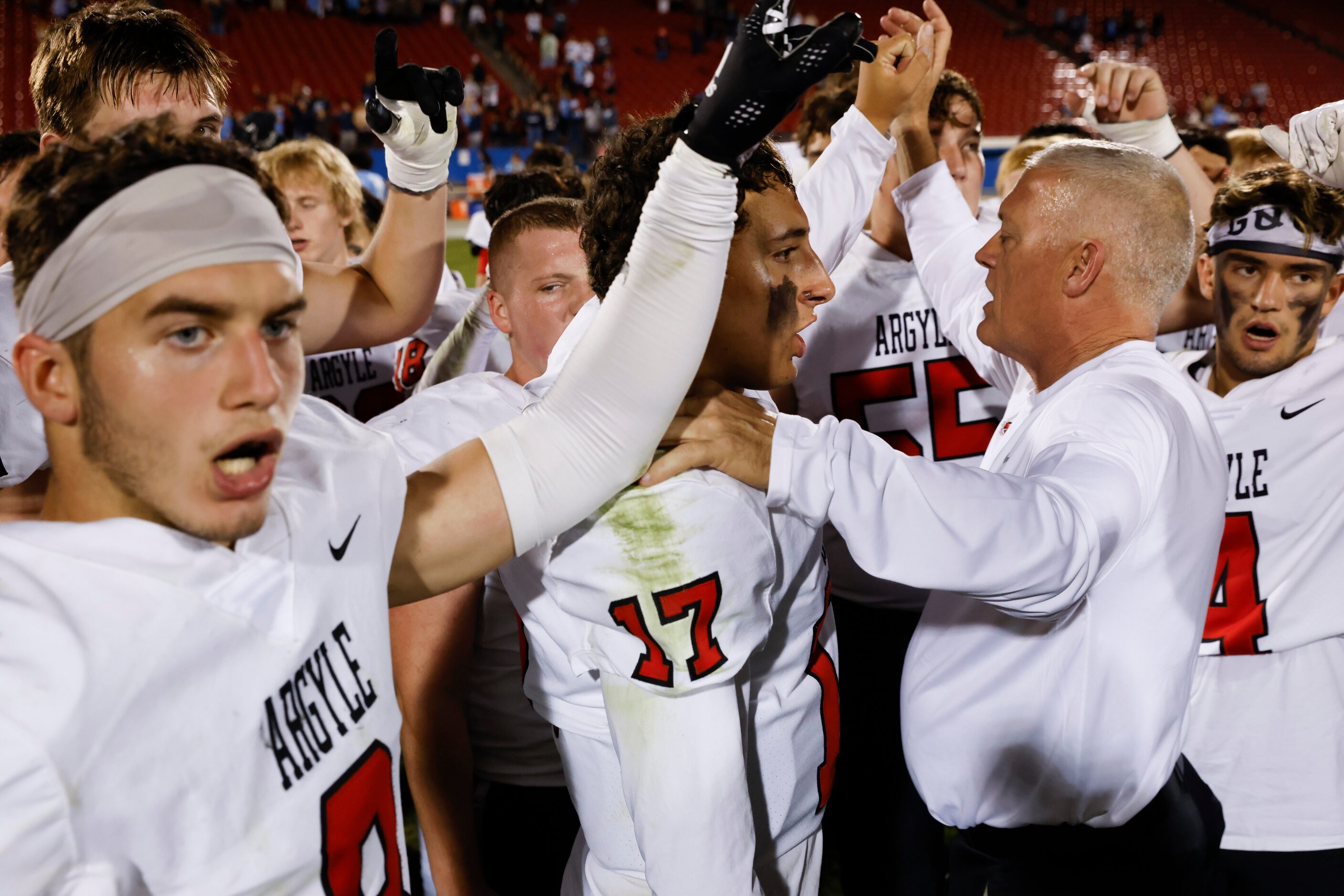 Argyle high players celebrate after winning against Emerson during a football game at Toyota...