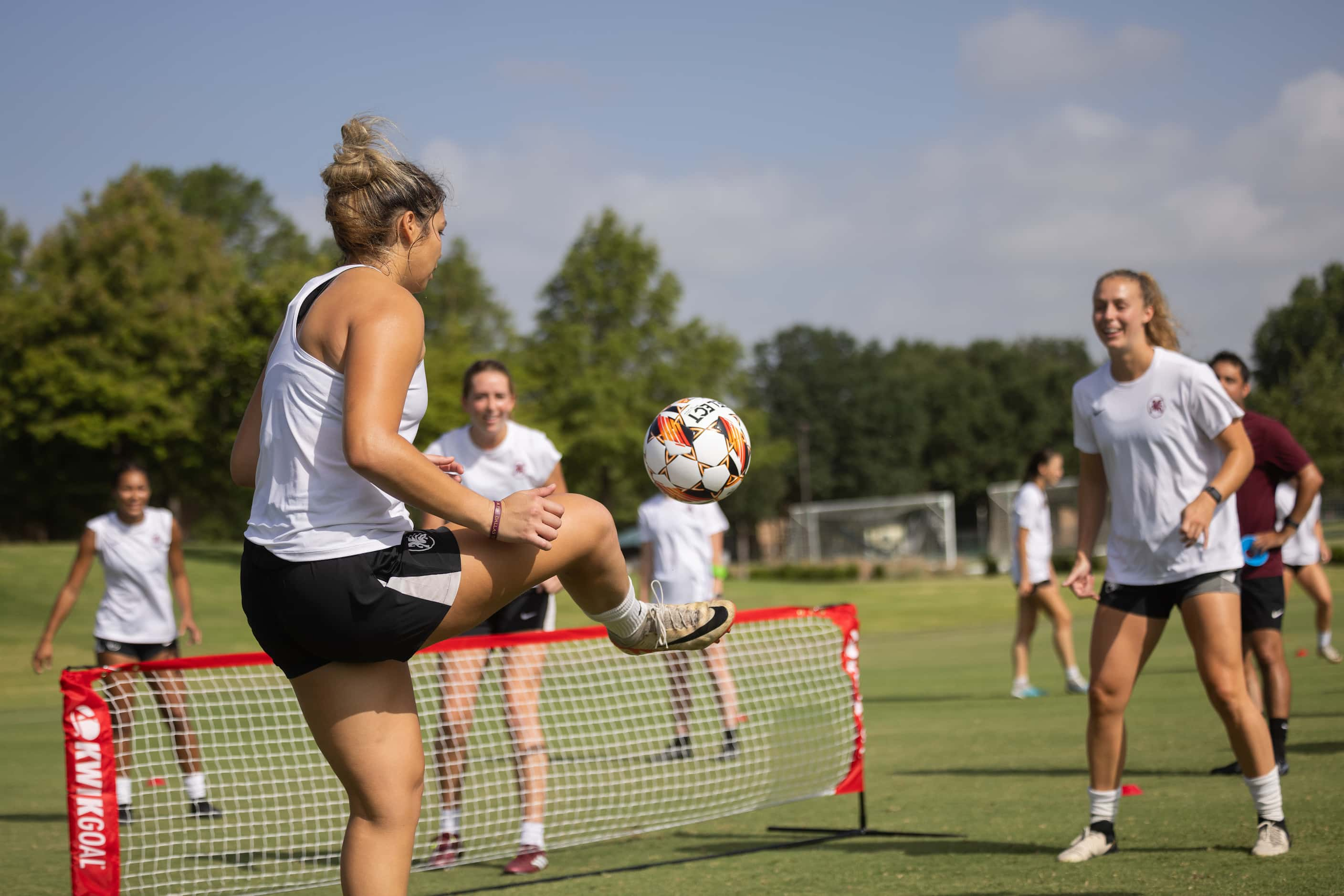 Dallas Trinity FC player Sam Estrada hits the ball during the brand new women's professional...