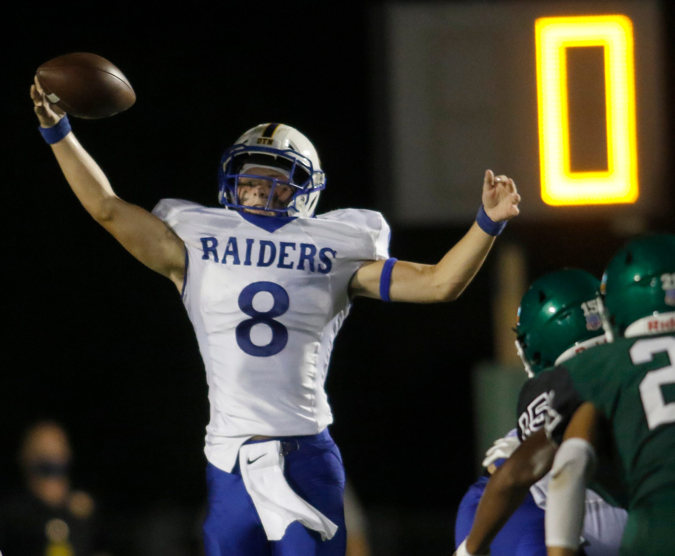 Sunnyvale quarterback Matt Mcada (8) reaches to pull in a high snap from center before...