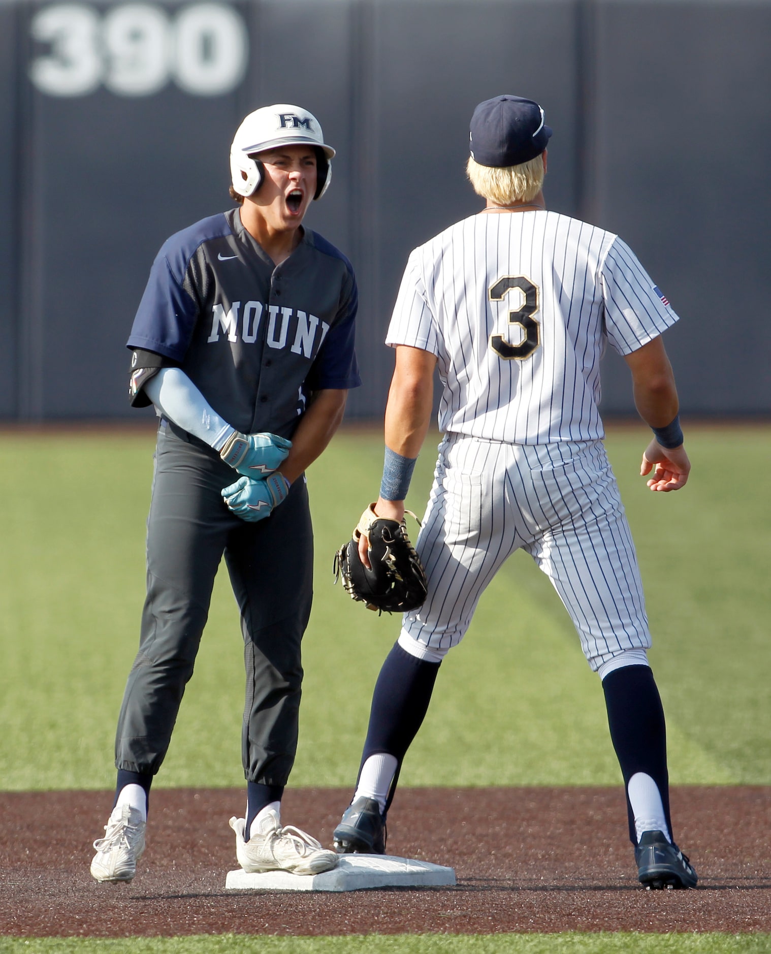 Flower Mound designated hitter Adam Hawrylak (5) lets out a yell following his lead-off...