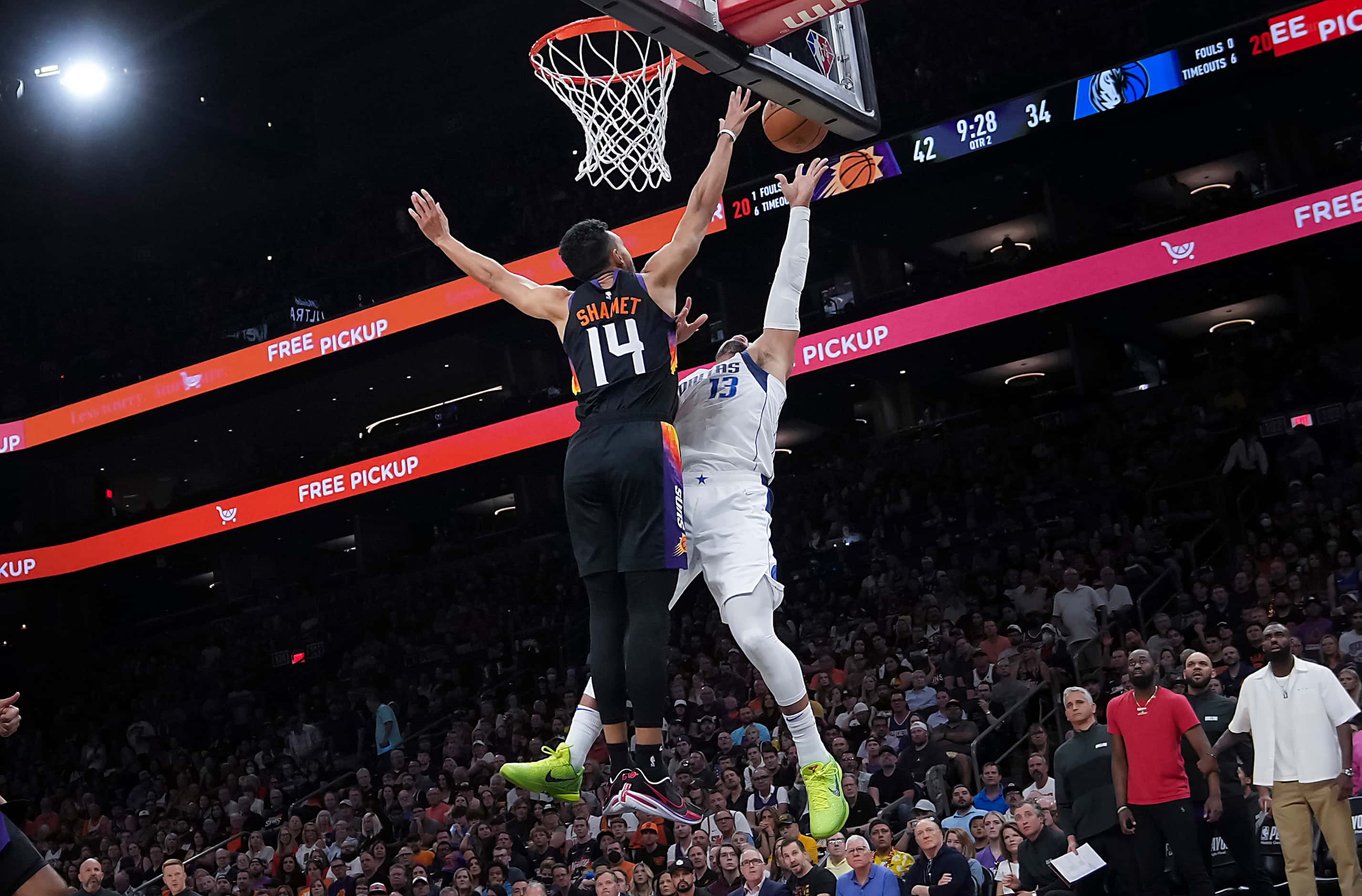 Dallas Mavericks guard Jalen Brunson (13) has his shot blocked by Phoenix Suns guard Landry...
