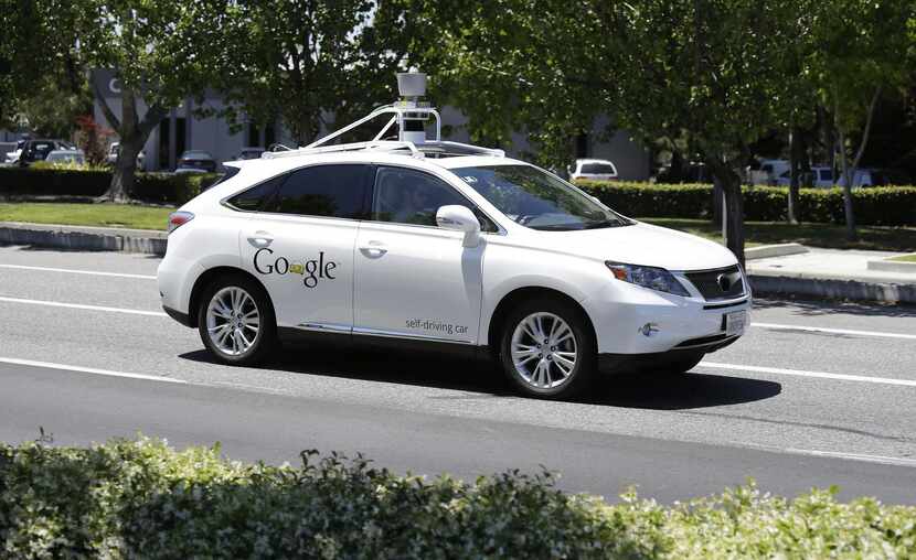 
In this May 13 2014, file photo, a Google self-driving car goes on a test drive near the...