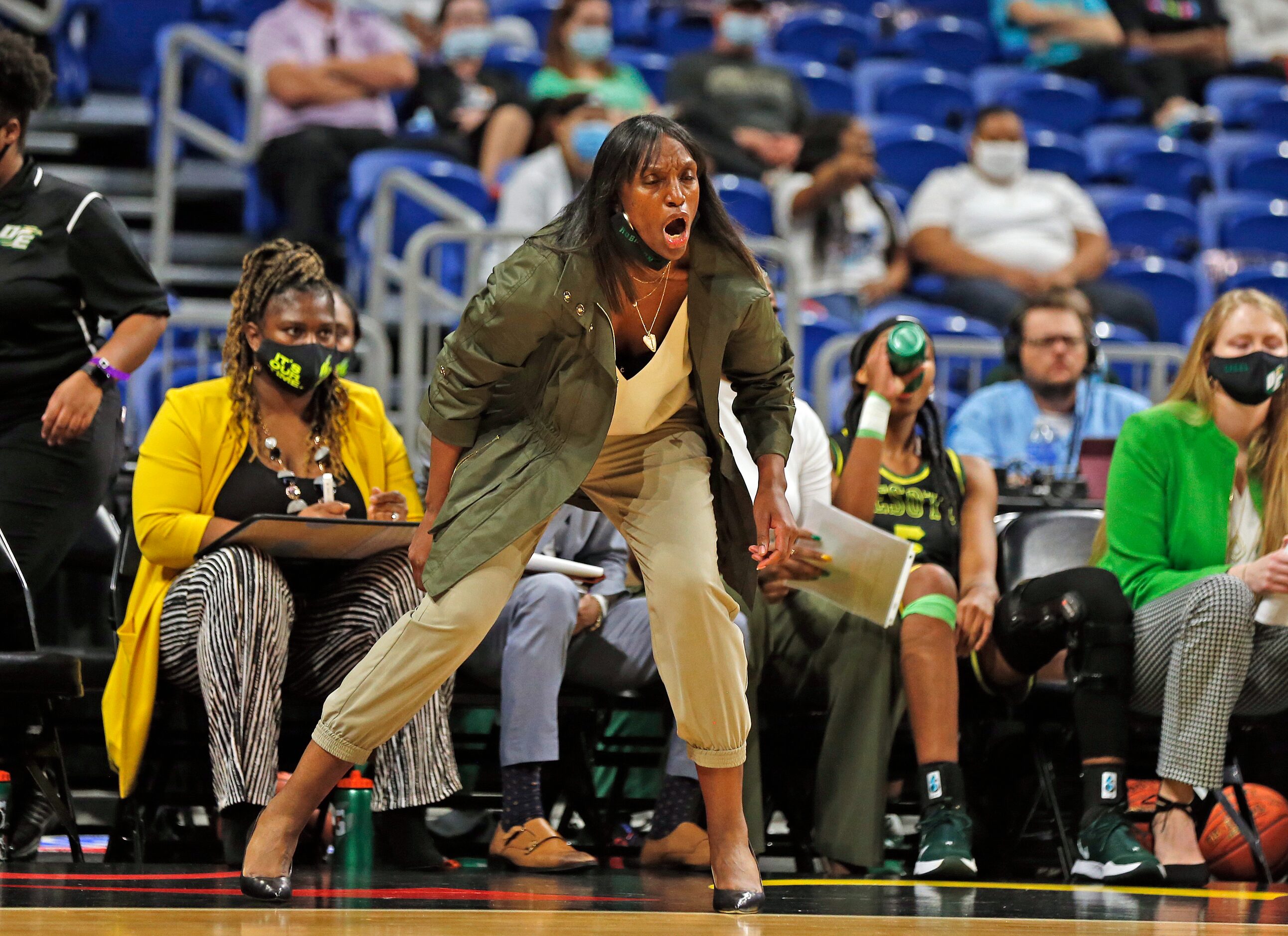 DeSoto head coach Andrea Robinson shouts out instruction. DeSoto vs. Cypress Creek girls...