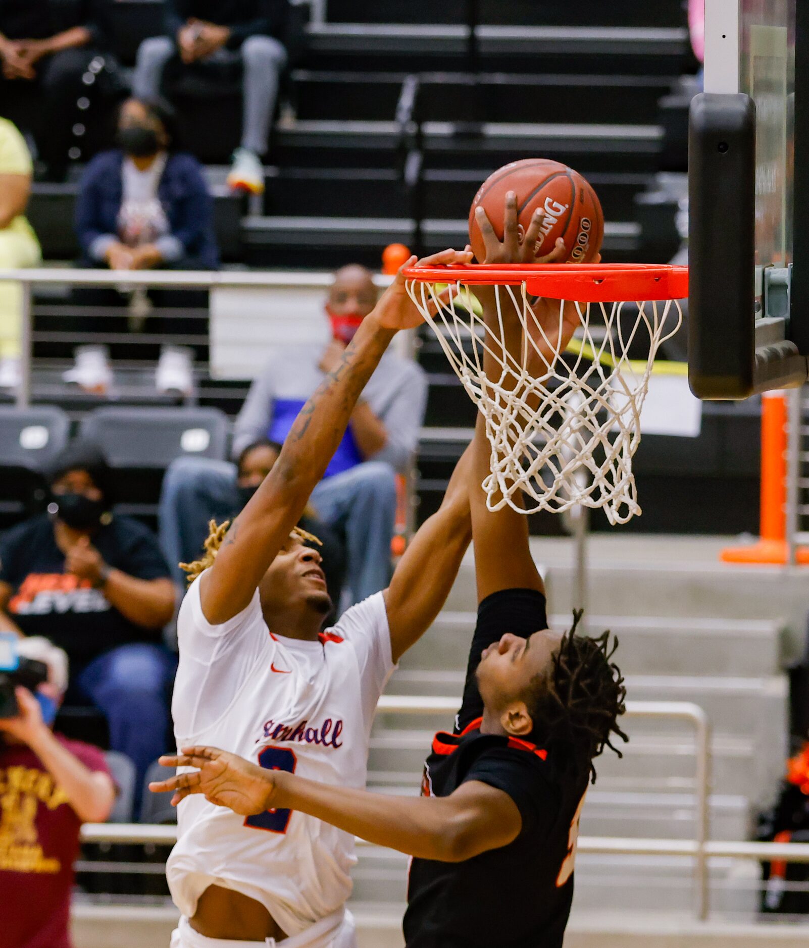 Lancaster's Chrisdon Morgan (33) blocks Kimball's Arterio Morris' (2) shot during the first...