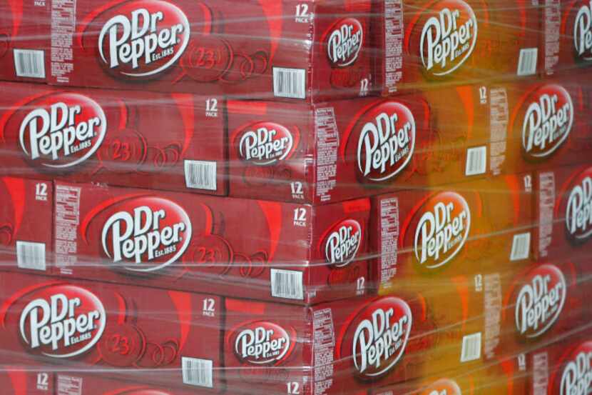 Pallets of Dr Pepper wait to be shipped out at a Coco-Cola bottling plant on February 10,...