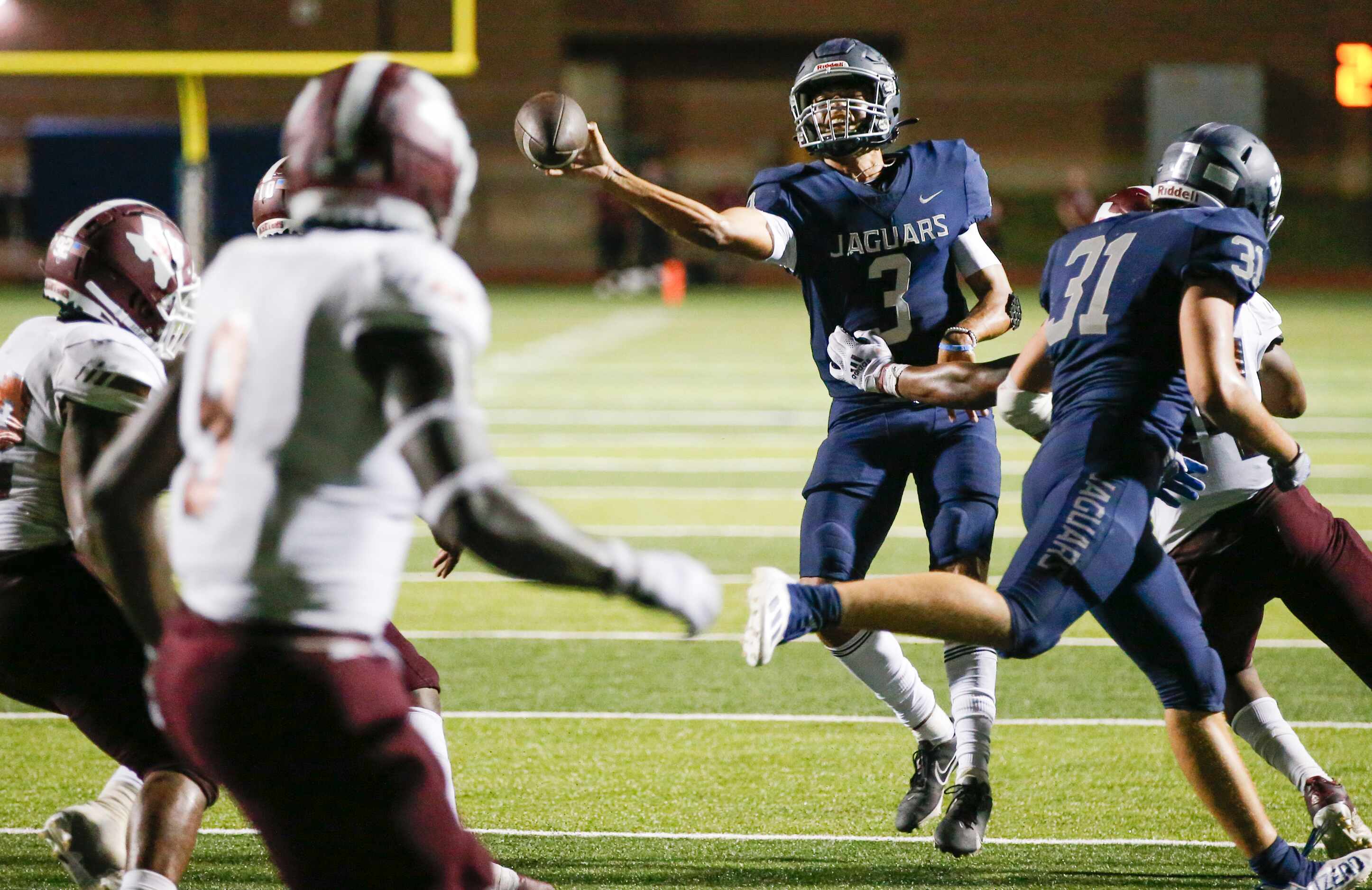 Flower Mound senior quarterback Nick Evers (3) throws during the second half of a high...