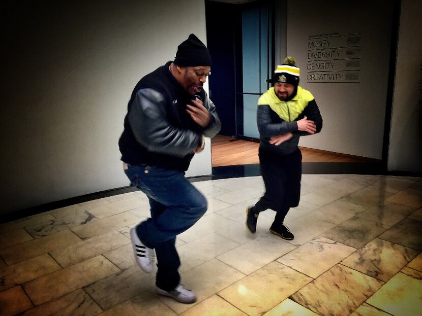 Grandmaster Caz demos some moves with B-boy Mighty Mouse during the Hush hip-hop tour of New...