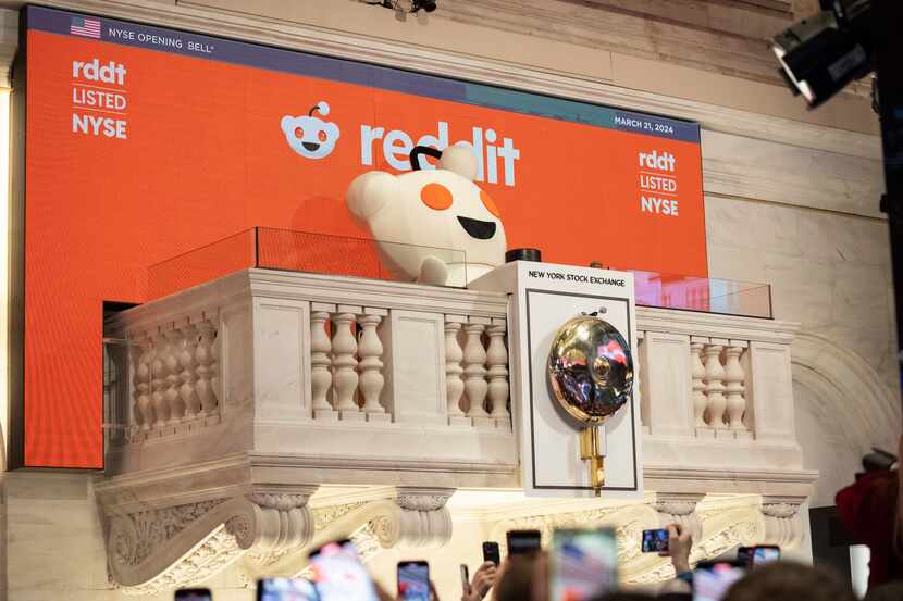 Reddit mascot Snoo rings the New York Stock Exchange opening bell, prior to the company's...